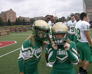 Ashley Williams (Left) & Kayla Spear (right) are ready to switch from cheerleaders to football players.