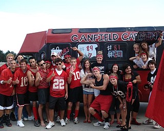 Canfield Seniors 08 rev it up in front of their spirit bus before the Alliance game.  The group raised the proceeds for the bus and worked countless hours on the project to express their school pride and spirit.