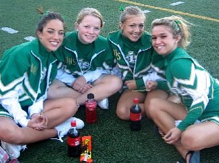 JoAnne Tombo, Kayla Spear, Ashley Williams and Annie Morris are pregaming before the game.