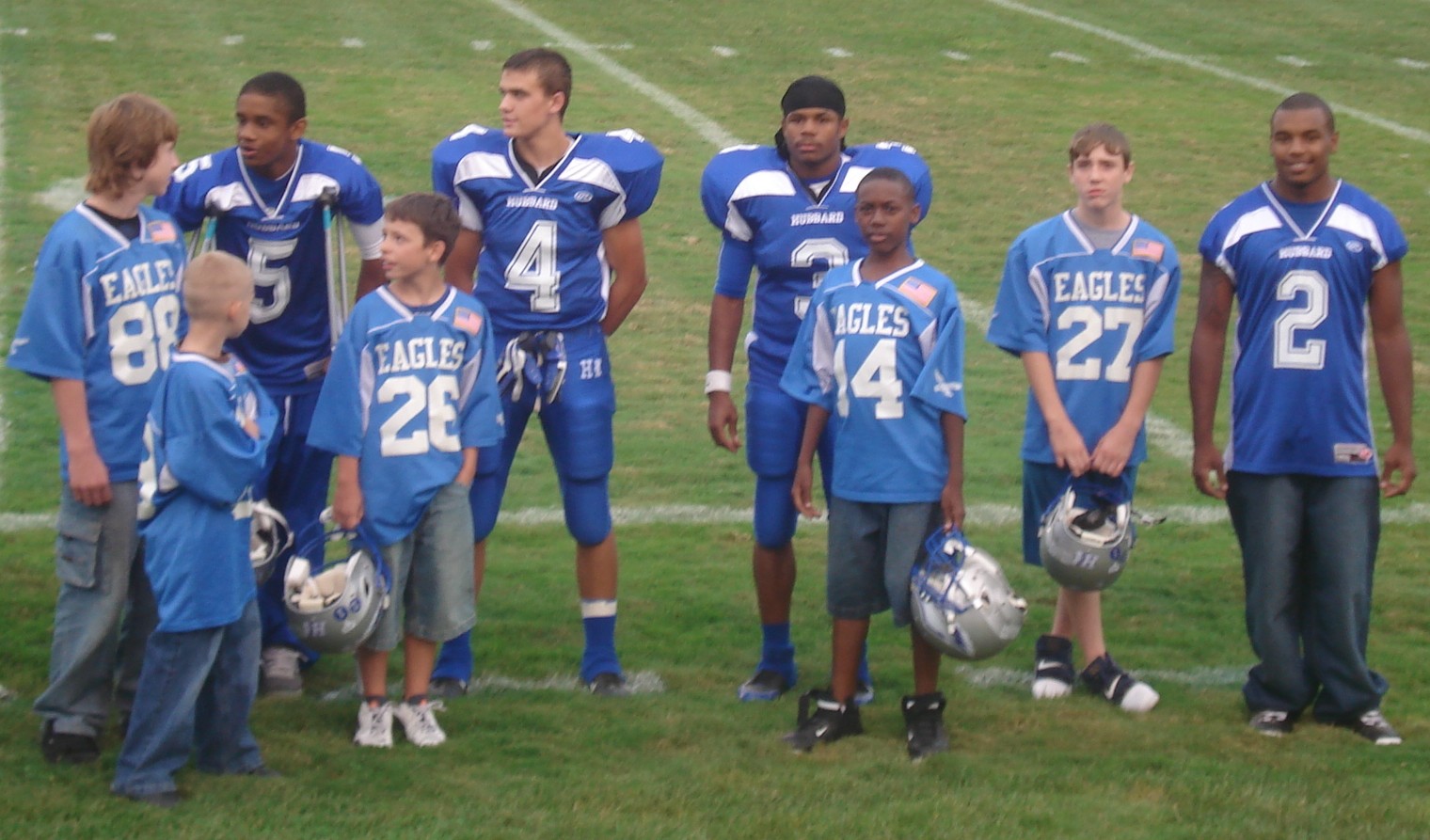 #4 Dave Urey, #3 Andre Taylor, and #5 Kurtis Drummond talking before big
brother/little brother