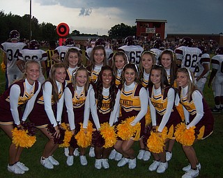Kennedy Catholic Cheerleaders stand behind their Golden Eagles during a match with Conneaut Lake