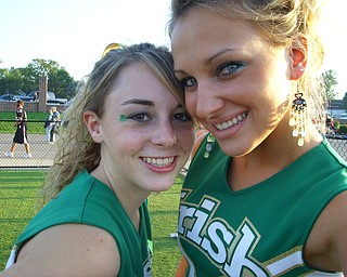 Ursuline Cheerleaders Lauren Anderson and Captain Katie Olenick
hit some pre-game poses!