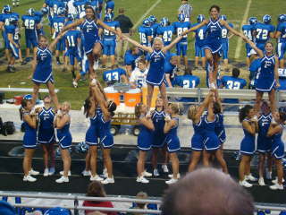 Poland Bulldog Cheerleaders perform the Liberty Stunt while cheering their team on to a 56-7 Victory