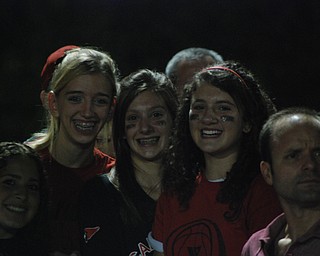 Here's a shot of Aleia Billic, Brielle Burton, Abby Malsch, and Maggie Bresnahan cheering on their Canfield Cardinals at homecoming!  