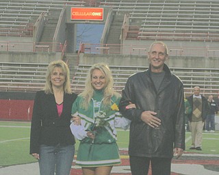 Pictures 409, DSCI0801 - The Olenick Family is full of smiles as they walk their daughter, Cheerleading Captain Katie Olenick, down Stambaugh Field on Ursuline High School's Senior Night!