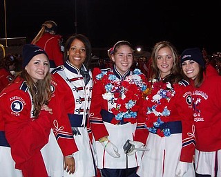 The Austintown Fitch Color Guard Takes a Second to pose for a picture Right before the half-time show. The Color Guard presents the Colors of the United States at every Fitch Football game To the National March the Stars and Stripes Forever [From Left to Right] Alissa Breakion, [Austintown Flag] Alyssa Yacavone,[American Flag], Kaitlynn Bitzer [Captain], Amber Lesko,[Co-Captain] and Liana Defuria [Ohio Flag]