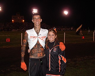 Greg Ramsey takes some time out from the student section for this pic with his "lil sis" Katie Bretz.