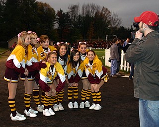 "It's Football Friday Night!" says the South Range Cheerleaders for the camera.