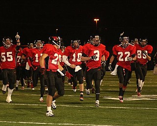 These are pictures taken at Friday nights game against Marion-Franklin on
November 2nd during Canfield's playoff victory. Number 10 is Mark Carrocce
(quarterback) and number 48 is Dan Banna (fullback). GO CANFIELD !!!  YOU
ARE #1  !!!!!