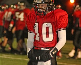These are pictures taken at Friday nights game against Marion-Franklin on
November 2nd during Canfield's playoff victory. Number 10 is Mark Carrocce
(quarterback) and number 48 is Dan Banna (fullback). GO CANFIELD !!!  YOU
ARE #1  !!!!!