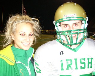 The Ursuline Irish advance to the state semi-finals with the help of Kicker Michael Metzinger and Cheerleader Katie Olenick smiling all the way to victory!
