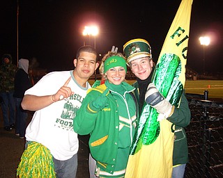 Katie Olenick and fellow classmates Steven Bernard and Louis Isabella show their team spirit. Go Irish!