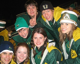 Here is a picture of students from the award winning Ursuline High School Band: (Top Row L to R) : Jimmy Hungerford, Dan Catello, Marshall Finelli (Bottom Row L to R) : Evan Sander, Erin Bouquet, Jen Stevens, and Annie Cadel at the Ursuline state semi-final playoff win against Columbus Bishop Ready on Friday at Canton Central Catholic Stadium. .