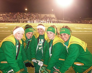 UHS Cheerleaders: Kayla Spear, Joanne Tombo, Ashley Williams, Lauren Anderson and Cara Mia Gatti, try to keep warm during Ursuline's state semi-final game