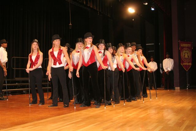 These are photos from Liberty High School's holiday concert, full choir and show choir.