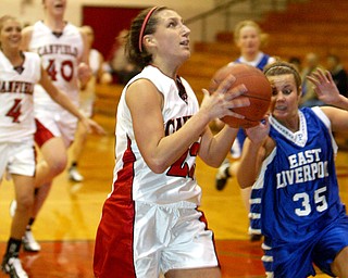 Canfield's Bryanne Halfhill scores 1,000th point.
