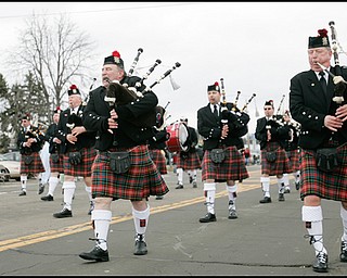 3.16.2008
Bagpipers walk along the parade path in Boardman during The 30th Annual Mahoning Valley St. Patrick’s Day Parade.

