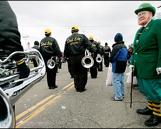 3.16.2008
Bob Ellwood, of Niles, watches The 30th Annual Mahoning Valley St. Patrick’s Day Parade in Boardman.

