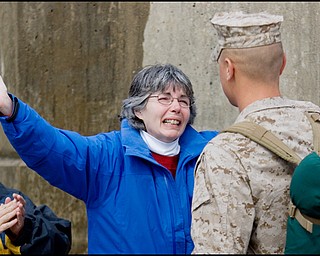 3.22.2008
Wendy Stanek, of Medina, welcomes her son, LCPL Gregory Stanek, as he returns from Iraq to the Youngstown Air Reserve Station in Vienna Saturday afternoon. Gregory is one of 23 marines who completed a seven month deployment with the Landing Support Equipment Company Marine Forces Reserve of the Youngstown Air Force Reserve.
