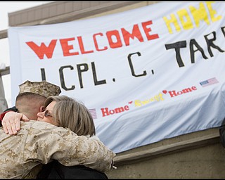 3.22.2008
Donna Tarr, of Willoughby, hugs her son, LCPL Chris Tarr, after his return to the Youngstown Air Reserve Station in Vienna following a seven month deployment in Iraq.
