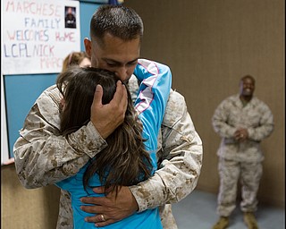 3.22.2008
Gunnery Sargeant Chuck Norris hugs his daughter, Sierra Norris , age 11 of Hermitage, at the Youngstown Air Reserve Station after a seven month deployment in Iraq.
