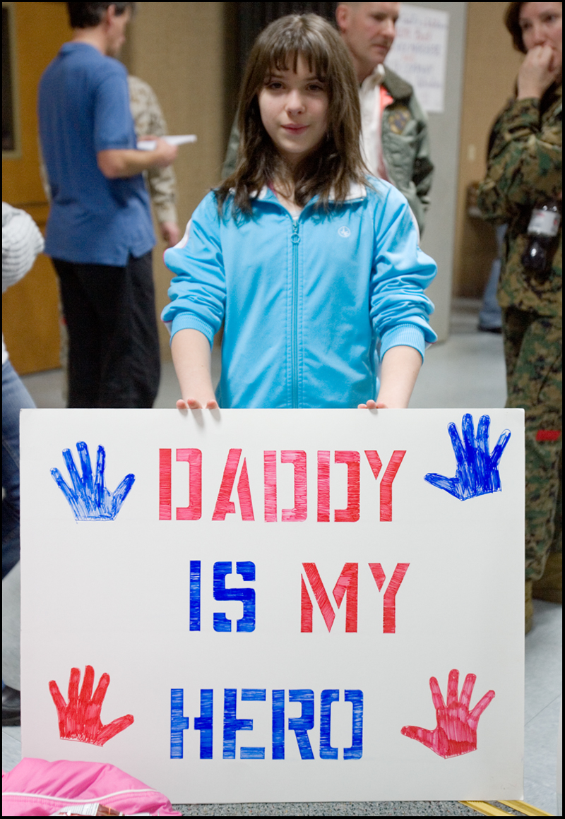 3.22.2008
Sierra Norris, age 11 of Hermitage, holds a sign in anticipation of her father's return from a seven month deployment in Iraq at the Youngstown Air Reserve Station in Vienna.
