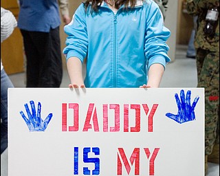 3.22.2008
Sierra Norris, age 11 of Hermitage, holds a sign in anticipation of her father's return from a seven month deployment in Iraq at the Youngstown Air Reserve Station in Vienna.
