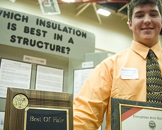 For his interesting findings, gleaned from experiments on different types of insulation, Geneva High School student Braxton Wessell, 17, won the "Best of Fair" award and a four-year scholarship to Youngstown State University.  The problem of insulating his families hog shed motivated Wessell to begin testing different heat-trapping materials. After weeks of trial and error, Wessell determined spray-foam insulation to be best at containing heat. A common household fabric material comes in second at a much lower cost. Surprisingly, pink fiberglass insulation was one of the least effective. 