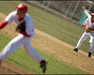 4.2.2008
Youngstown's C.J. Morris mans 3rd Base as his teamate pitches to the Duquesne Dukes Wednesday afternoon at Cene Park in Struthers.
