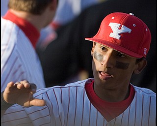 4.2.2008
Youngstown Penguin David Leon (16) high-fives his teamates after making a crucial play to end an inning with the Duquesne Dukes Wednesday afternoon at Cene Park in Struthers.