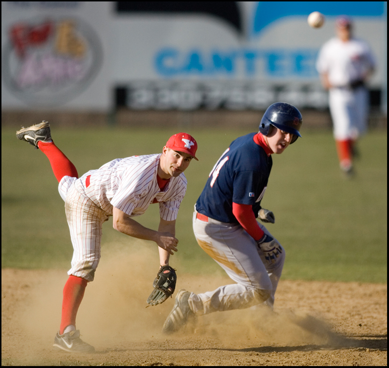 4.2.2008
Youngstown Penguin Josh Page (8) throws the ball to first in hopes of a double play after forcing Mike Carroll (44) of Duquesne Dukes out during a match up Wednesday afternoon at Cene Park in Struthers.
