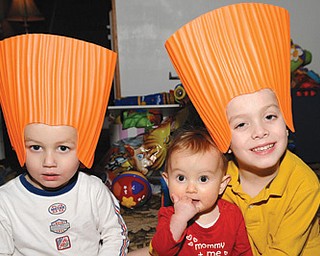 Alex, Hannah, and Nick LaPlante celebrate the recent circus in Youngstown with "Bello" hair.