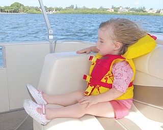 FIRST BOAT RIDE: McKenna Sweeney of Boardman , 2 1/2 years old, on Seista Key, Florida.