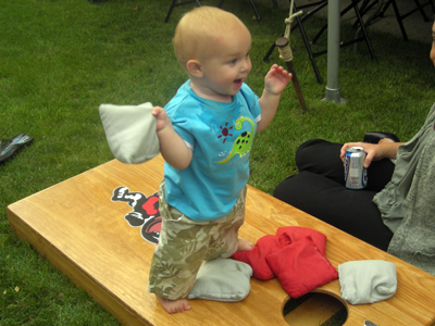 BABY DOM GOT GAME: Dominic Zitello , 1,  getting in on the Corn Hole Craze. Son of Brent and Lisa Zitello of Austintown.  Submitted by Grandma Dottie Zitello.
         