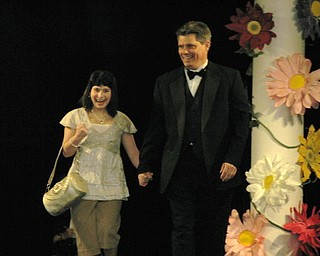 Kids and local celebrities model at the Angels of Easter Seals Spring Fashion Show