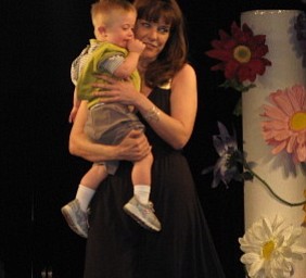 Kids and local celebrities model at the Angels of Easter Seals Spring Fashion Show