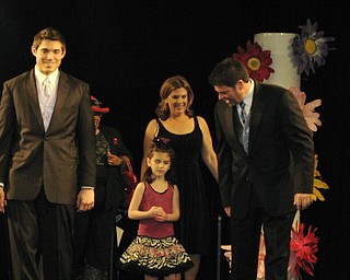 Kids and local celebrities model at the Angels of Easter Seals Spring Fashion Show