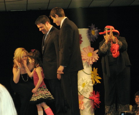 Kids and local celebrities model at the Angels of Easter Seals Spring Fashion Show 