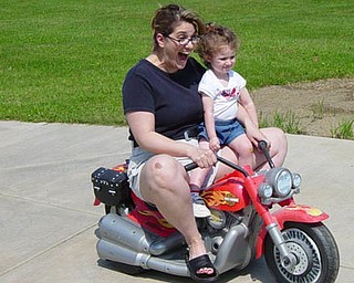 Jill Moran's daughter, Madelyn, 3, enjoys a ride with mom.