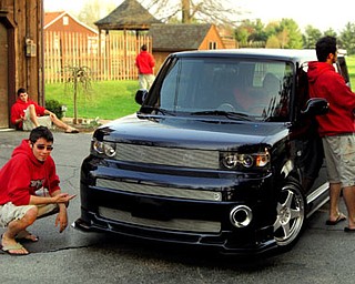 Kevin DeOliveira of Accent Media in Youngstown loves his tricked-out Scion.