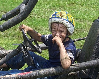 Boys will be Boys! Tyler Fortunato, son of Nici Fortunato has fun at Gaga and Papa's house on his dune buggy, it's where the fun rides are at. He is the grandson of Cheri and Stan Savaet of New Middletown.