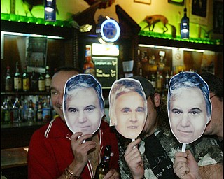 Royal Oaks Tavern patrons with cutouts of Jim Traficant, the former congressman, currently in jail, during a birthday party Thursday.