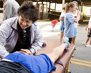 Laughing out loud, Jean McConnell of Pinacle Health Concepts went to work on Murray and many others.