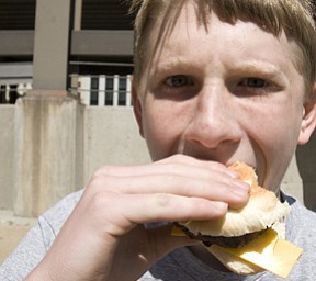 There was nothing calm about the way Jason Shilling, 13, of Boardman, devoured a burger after the race.
