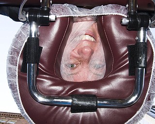 While others ate, Beth Murray of Boardman laid face-down on one of the outdoor massage tables. "This is how I've always wanted to be photographed," she said.