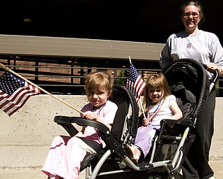 Jenn Quinlan of Boardman pushed daughters Adrianna, 4, left, and Genevieve, 3, the entire five mile with flags that must have decreased aerodynamics. Both girls made it clear that the concept of drag does not bother them.