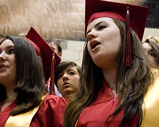 Valedictorian Pamela Galioto, left, and Amanda Clifton sing with the show choir.