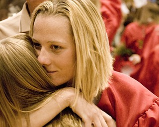 As the crowd cleared out, Fair's pent-up-slide-show-emotion gushed out as she embraced her nine-year-old cousin, Madison Bellis of Lowellville.