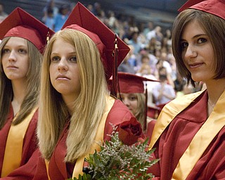 A tighter shot of the group give us a look into the eyes of Gina Martire, right. Martire plans to attend Baldwin Wallace College and pursue a degree in film, specifically, horror. Her cinematic interests include cannibalism, she said after the ceremony. Hard to believe, but a second look at her expression makes you wonder what she'll put on film in the years to come.