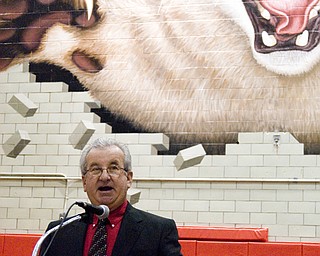 Struthers Superintendent Don Daily helped open commencement with a speech centered around the word 'red,' and the impact of a Struthers education. He ended by wishing graduates inspiRED, incREDible futures. The 'impact' portion of his speech was underlined by the giant cat smashing through the brick wall behind him.